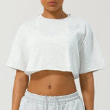 CASSIA™ – Rentouttava istuvuus Crop Tee